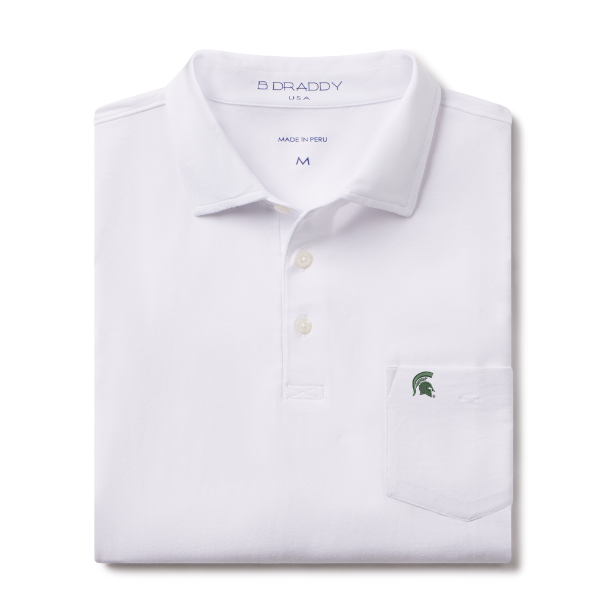 Folded white polo shirt with a collar and three buttons, featuring a small chest pocket with an embroidered green Spartan helmet logo and 'B DRADDY USA' branding inside the collar.