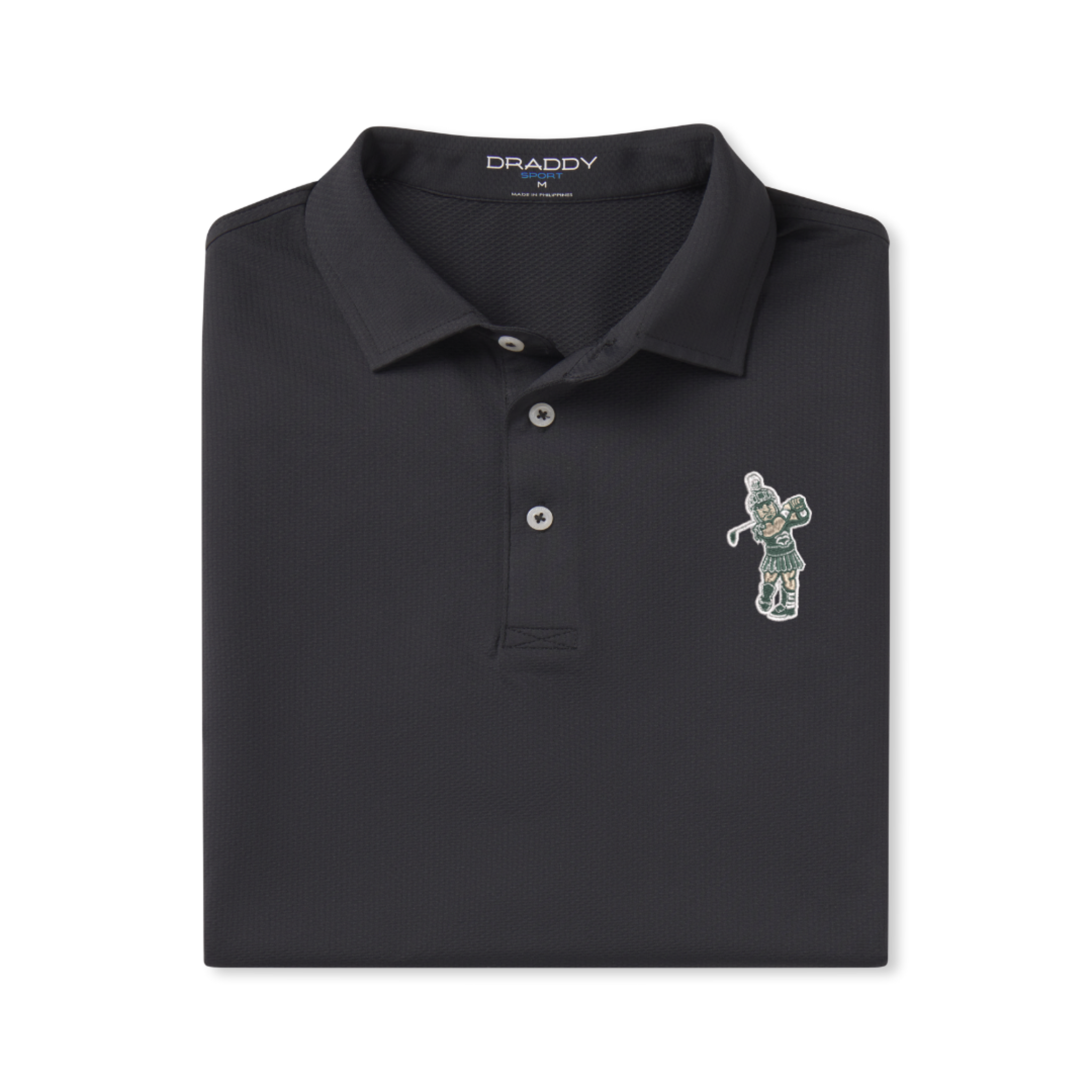 Black DRADDY polo shirt neatly folded, featuring a collar with three buttons and an embroidered patch of a golfing Sparty in green swinging a club on the left chest.