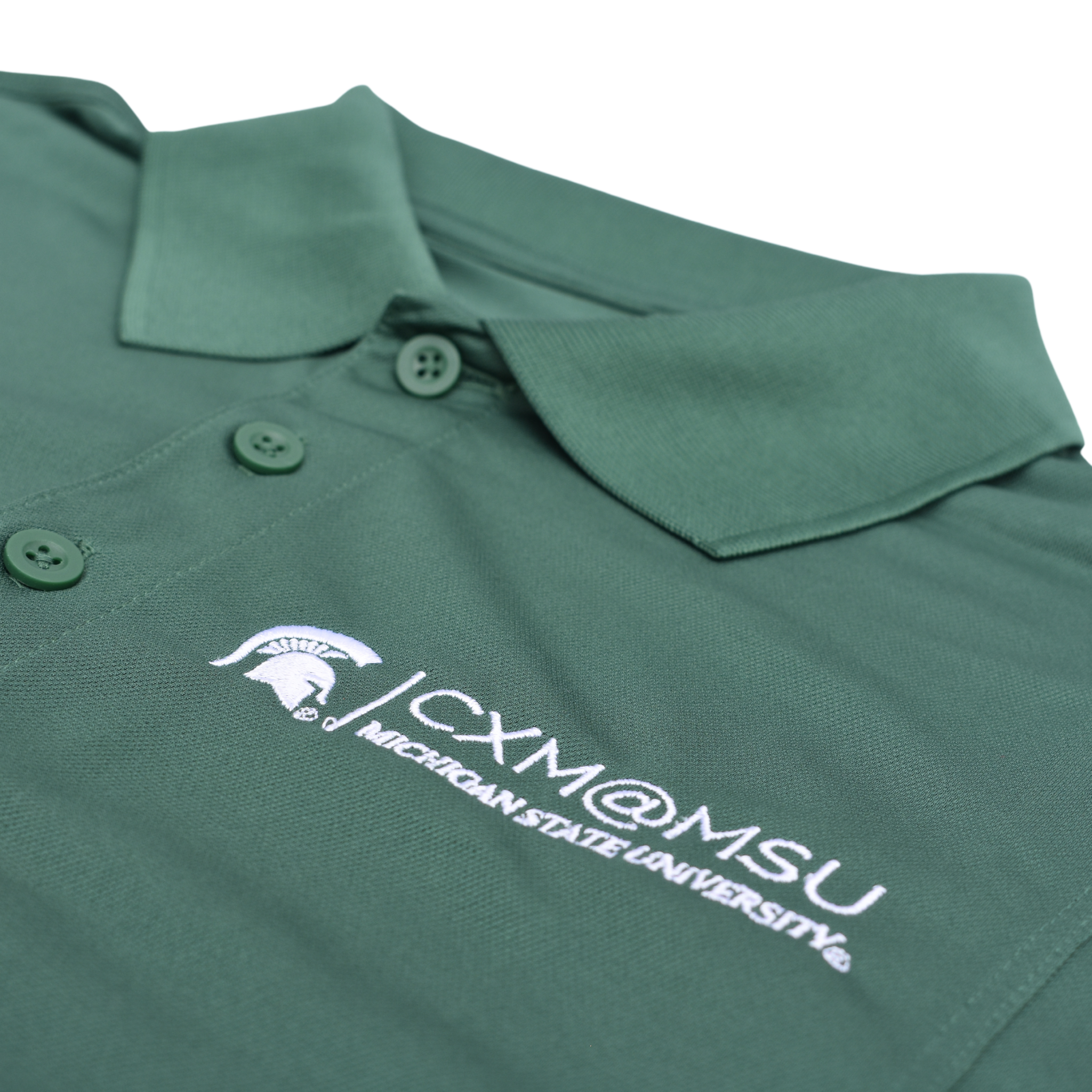 Close up of the embroidered CXM at MSU signature logo