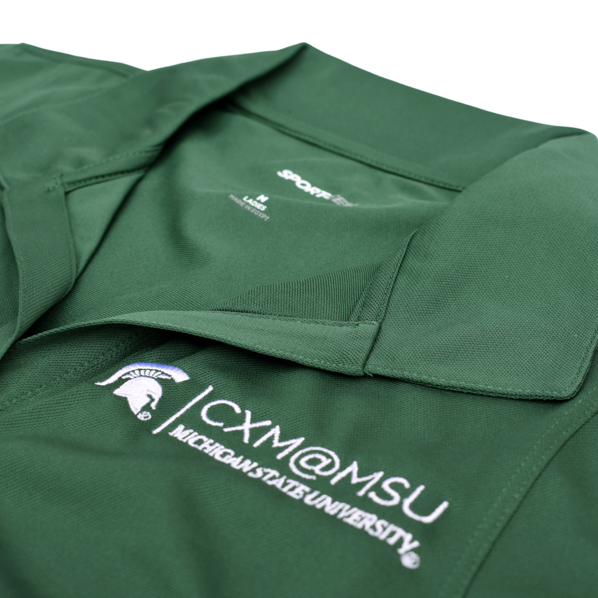 Close up of the embroidered CXM at MSU signature logo