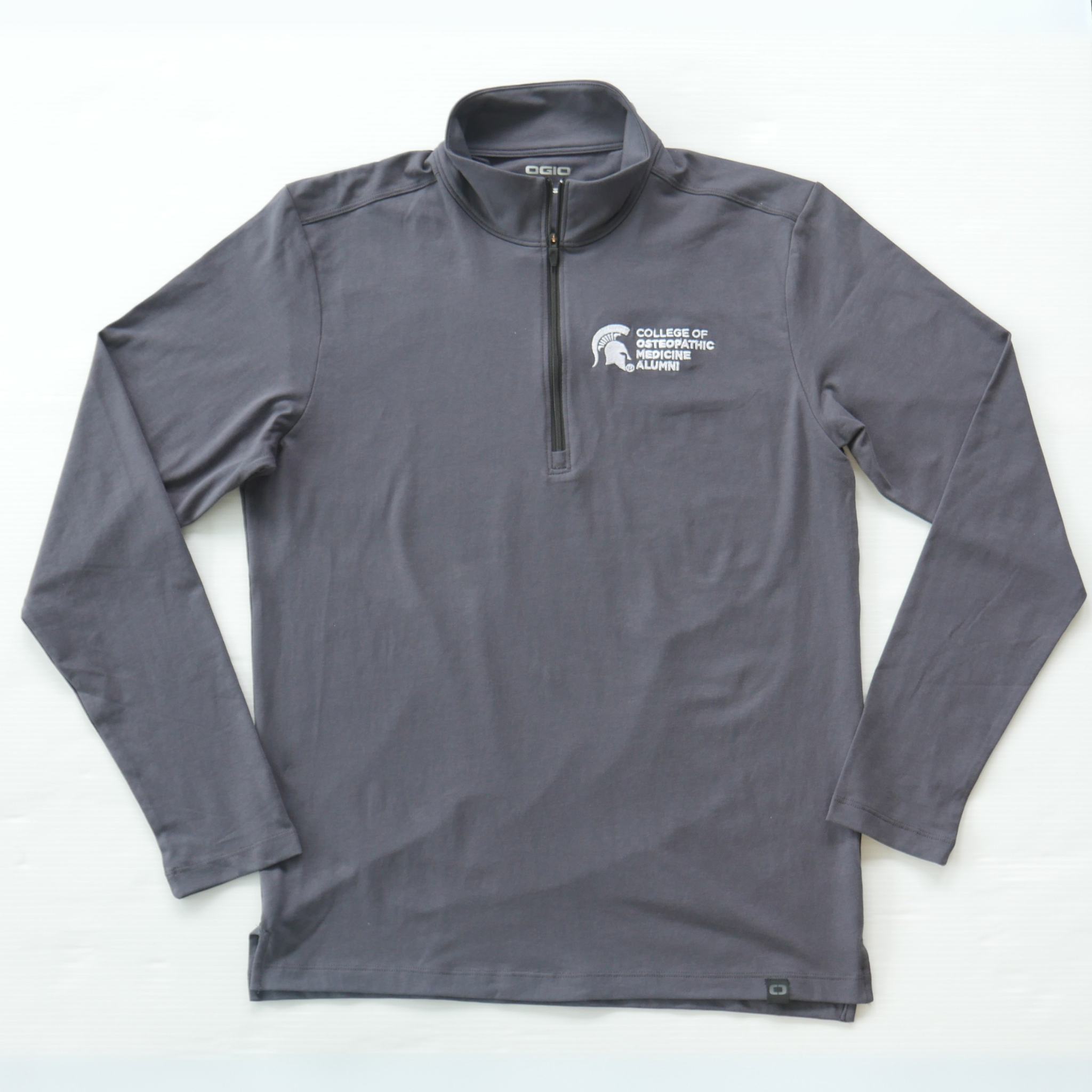 Front of charcoal gray quarter zip pullover with College of Osteopathic Medicine Alumni logo embroidered in white on the left upper chest.