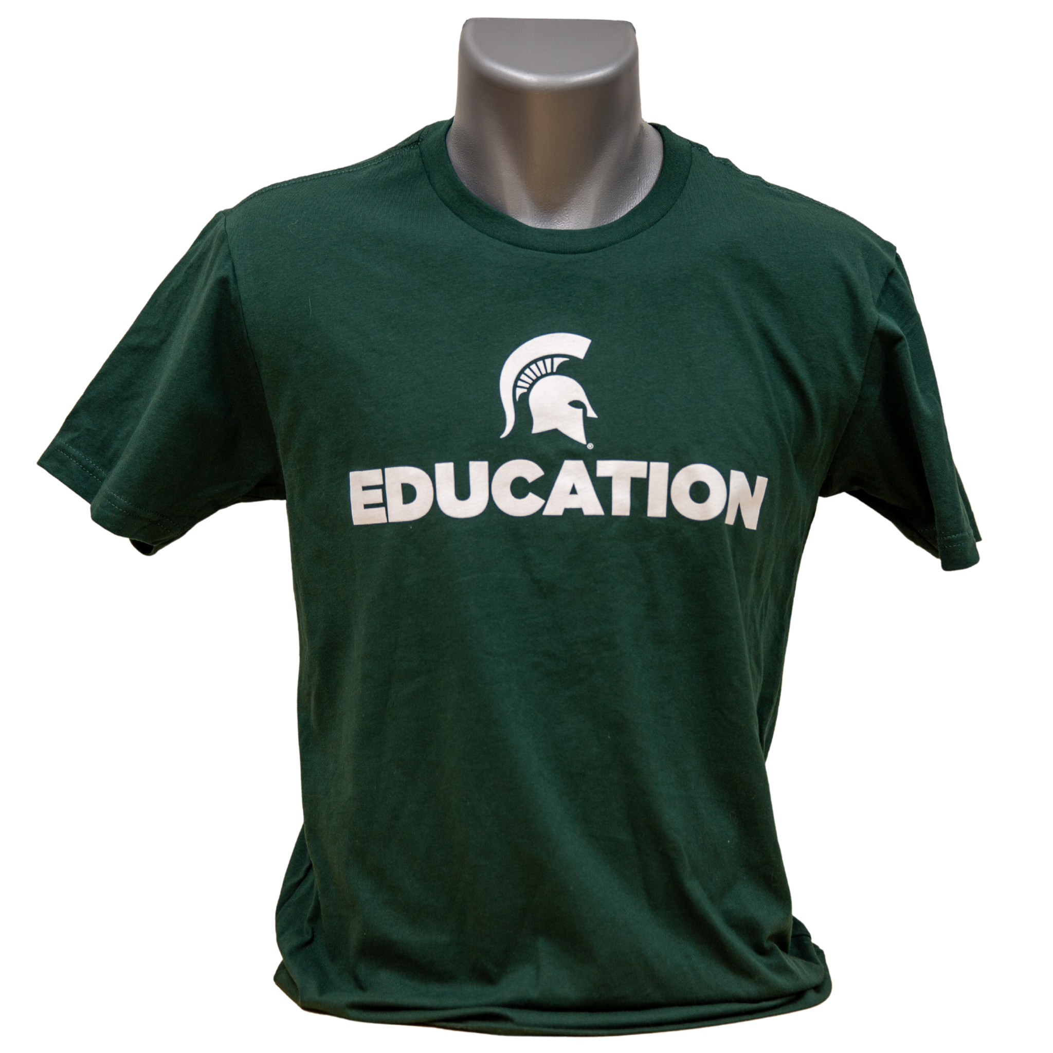 Forest green unisex short-sleeve crewneck t-shirt with a white Spartan helmet over text reading education in all caps.