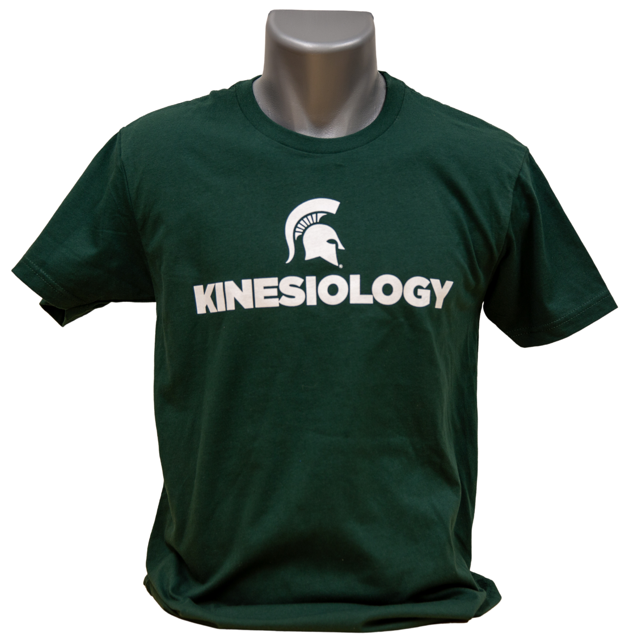 Forest green short-sleeve unisex crewneck t-shirt with a white Spartan helmet over text reading kinesiology in all caps.