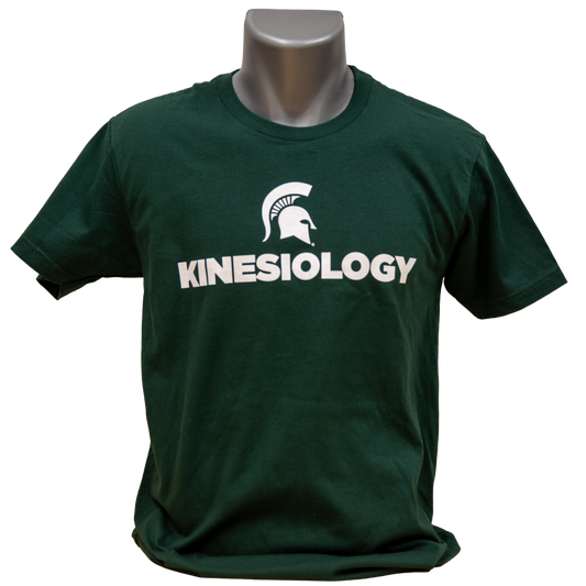 Forest green short-sleeve unisex crewneck T-shirt with a white Spartan Helmet logo above text reading "Kinesiology" in all caps. Shown on a mannequin.