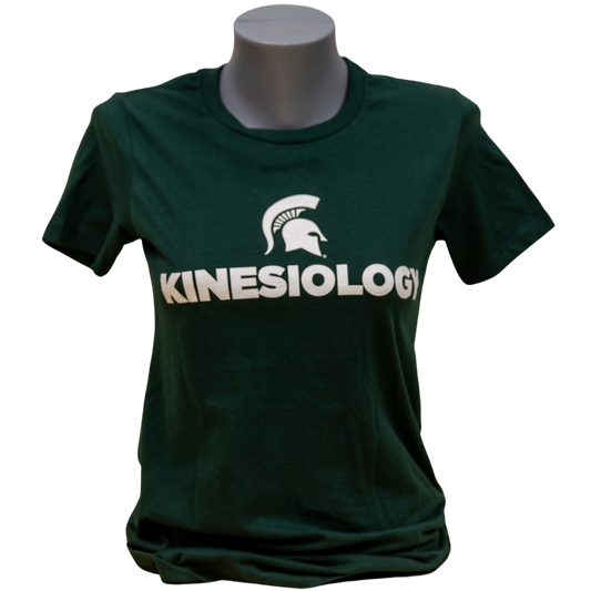 Forest green short-sleeve women's crewneck T-shirt with a white Spartan Helmet logo above text reading "Kinesiology" in all caps. Shown on a mannequin.