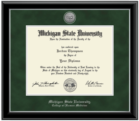 Black diploma frame with silver inner lining. Green suede matts with silver lining around opening for diploma. Silver engraved Michigan State University seal at top of matting. In silver letters 'Michigan State University' at the bottom of matting. Below that in silver letters 'College of Human Medicine'.