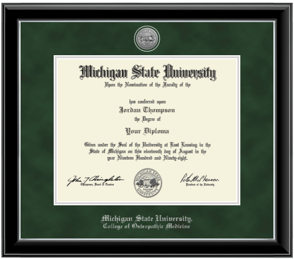 Black diploma frame with silver inner lining. Green suede matts with silver lining around opening for diploma. Silver engraved Michigan State University seal at top of matting. In silver letters 'Michigan State University' at the bottom of matting. Below that in silver letters 'College of Osteopathic Medicine'.