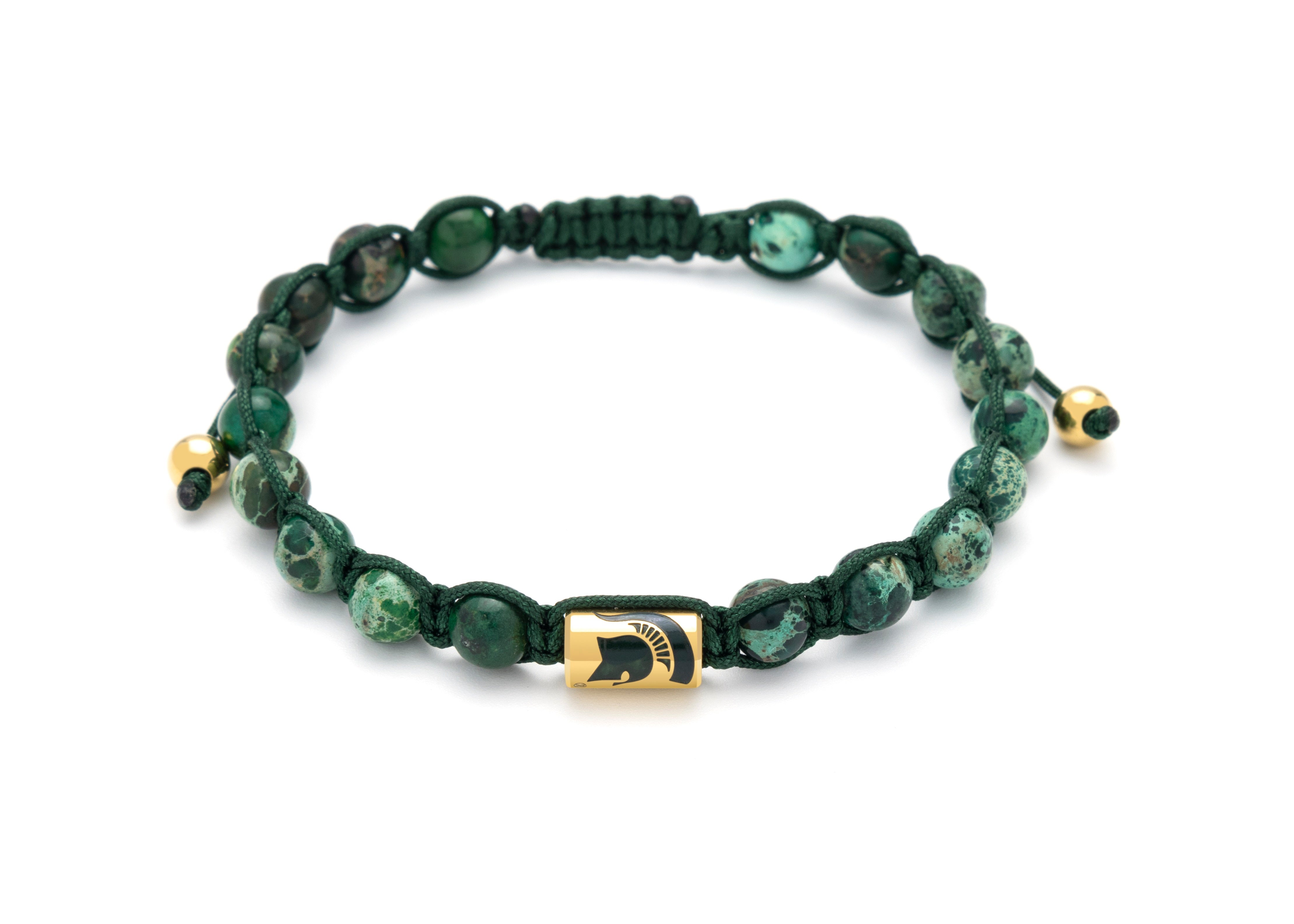 Green and black beaded bracelet with gold Spartan helmet charm.