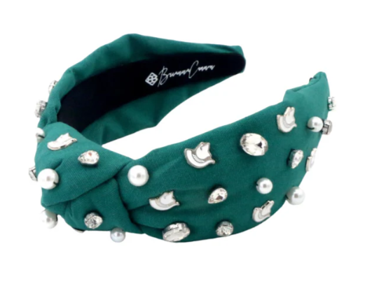 Green headband with pearls, rhinestones, and Spartan Helmet charms. The Brianna Cannon label is on the inside lining.
