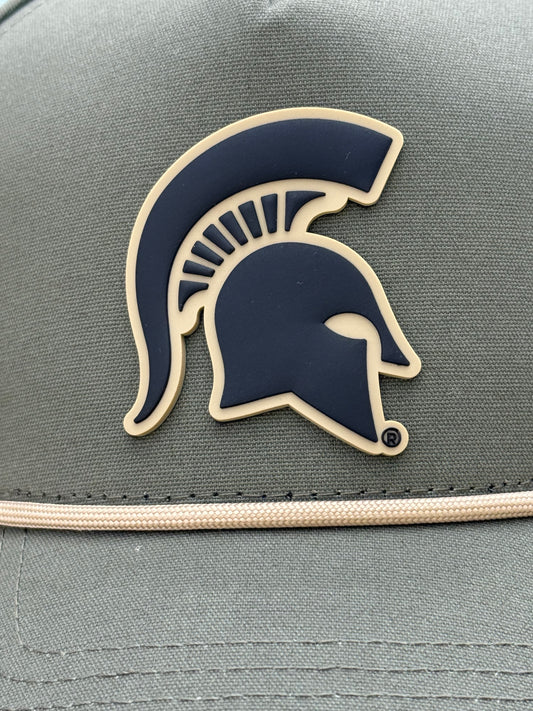 Close up of a gray hat, showing the Spartan Helmet logo.