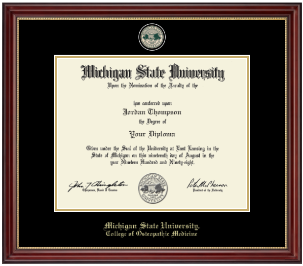 A dark cherry colored frame with gold accent on inner frame. Black matting with gold accent surrounding opening for diploma. At top is a gold engraved Michigan State University seal. Bottom of matting in gold letters 'Michigan State University'. Below in gold letters 'College of Osteopathic Medicine'.