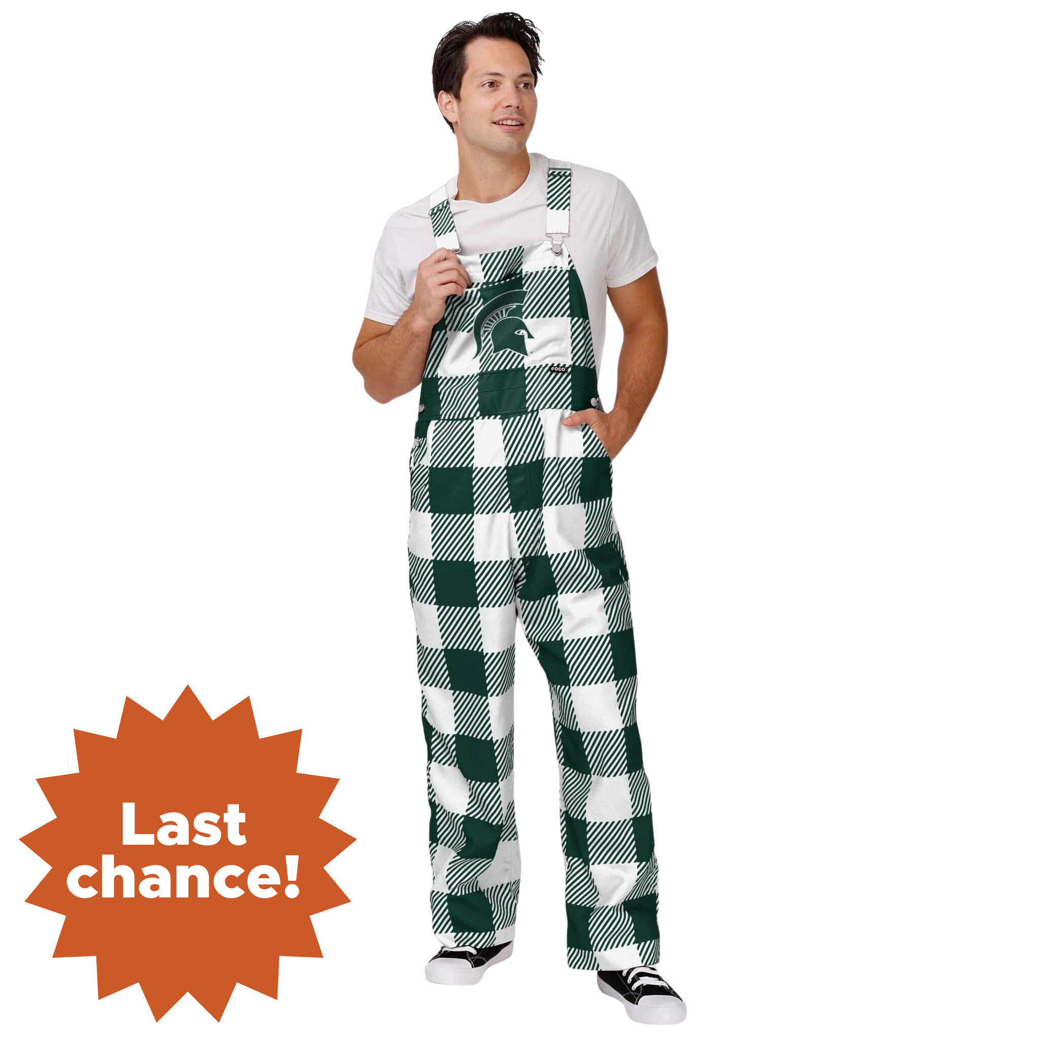 A person wearing plaid Michigan State overalls. The colors alternate between green and white. In the center torso is a green MSU helmet logo. In the lower left corner is an orange sunburst with the words "Last chance!"