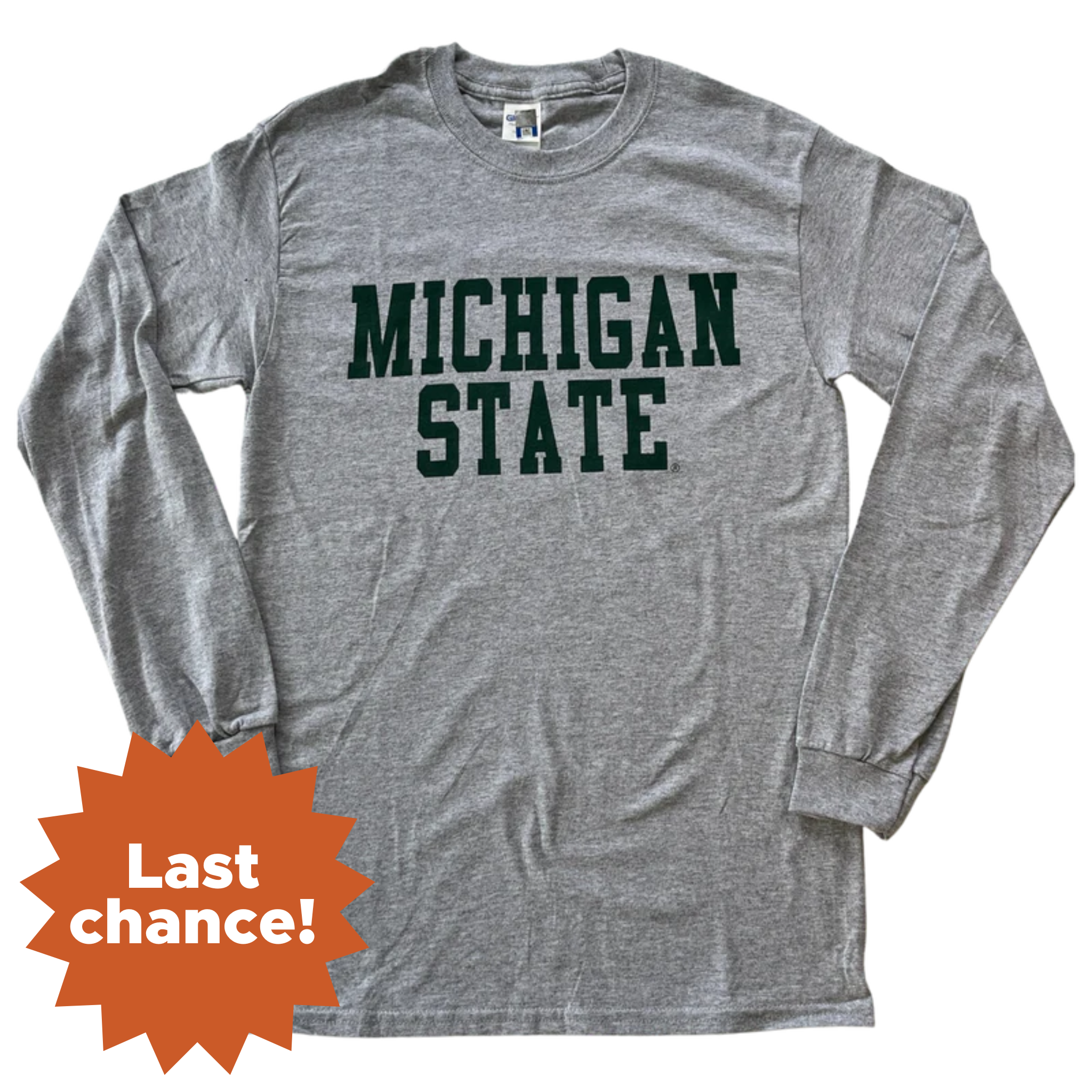 Heathered gray crewneck, long-sleeve t-shirt. Across center chest, forest green block letters read "Michigan State." In the lower left corner, an orange sunburst reads "Last chance!"
