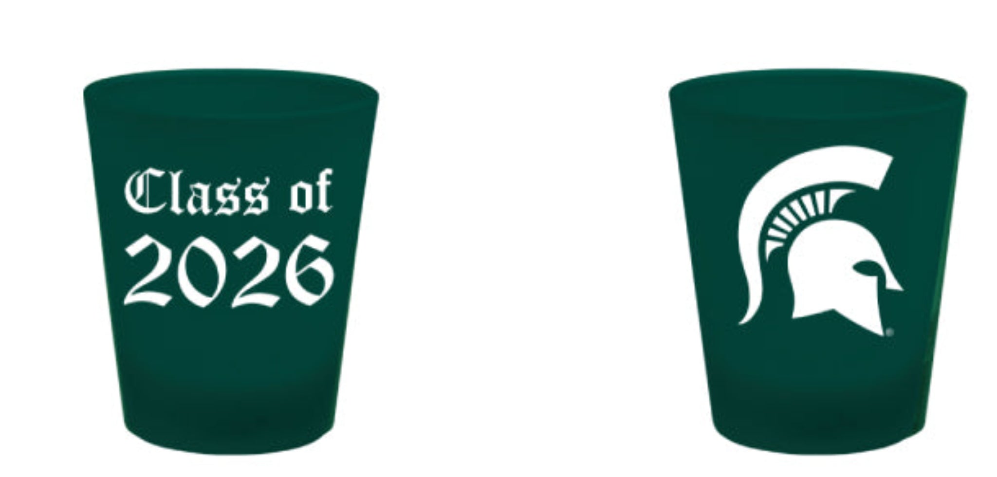 Two green shot glasses with white writing 'Class of 2026' and white Spartan helmet logo. Shown on a white background.