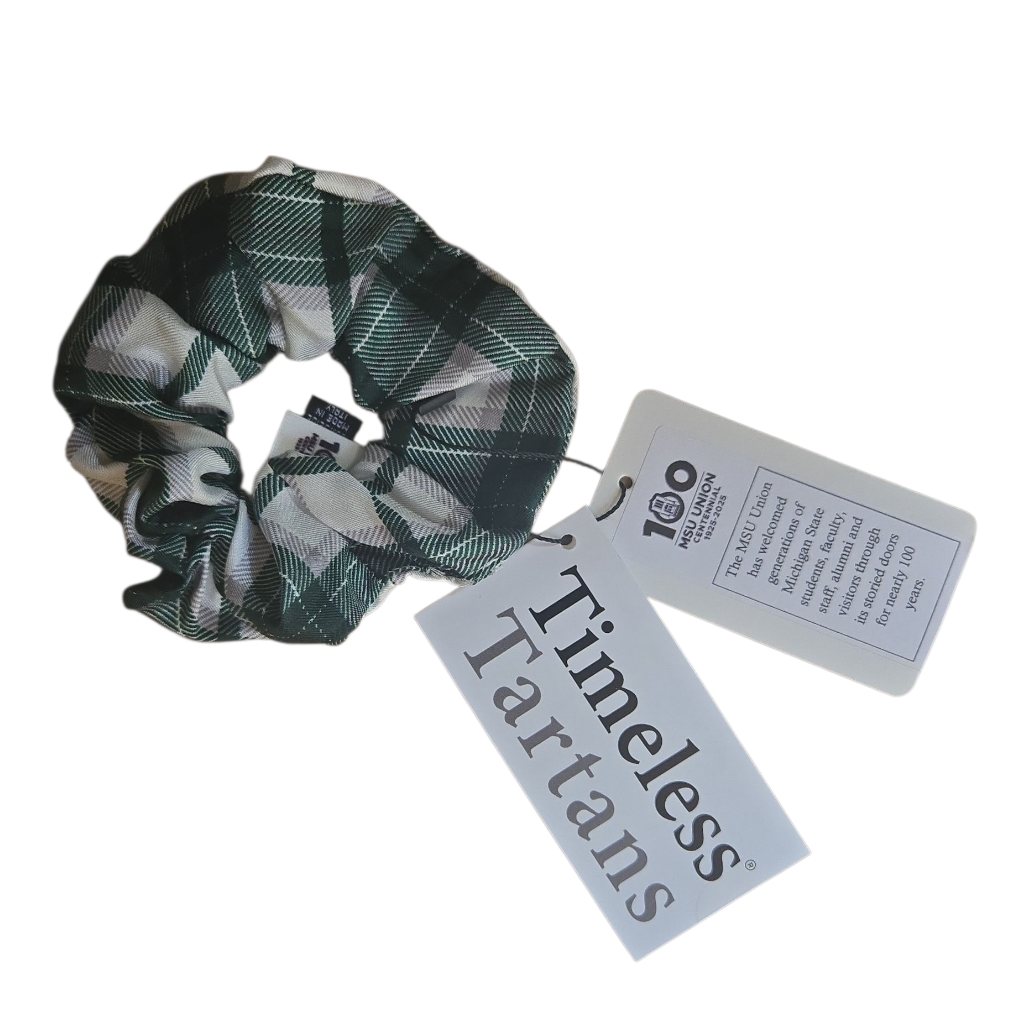 Plaid scrunchie with 'Timeless Tartans' label on a white background