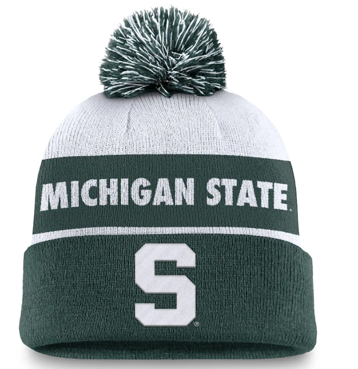 Green and white knit beanie with pom-pom, 'Michigan State' text, and 'S' logo on cuff.