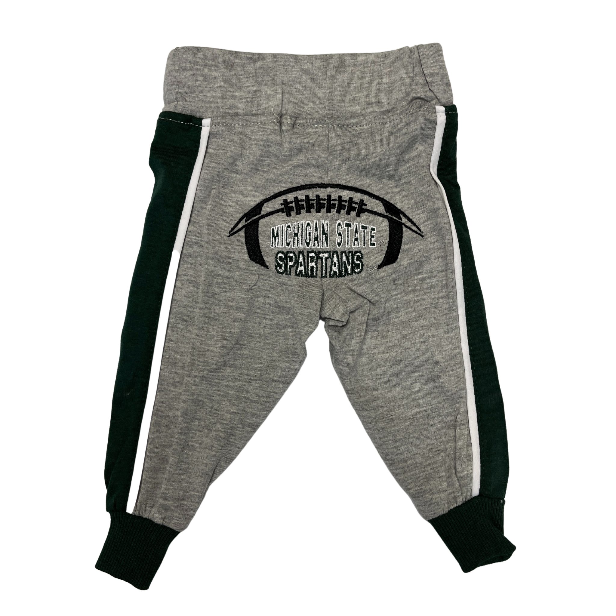 The back side of grey infant sweatpants with green lines going down the side of the pant legs. In the bottom area is the outline of a football with Michigan State Spartans written in the middle.