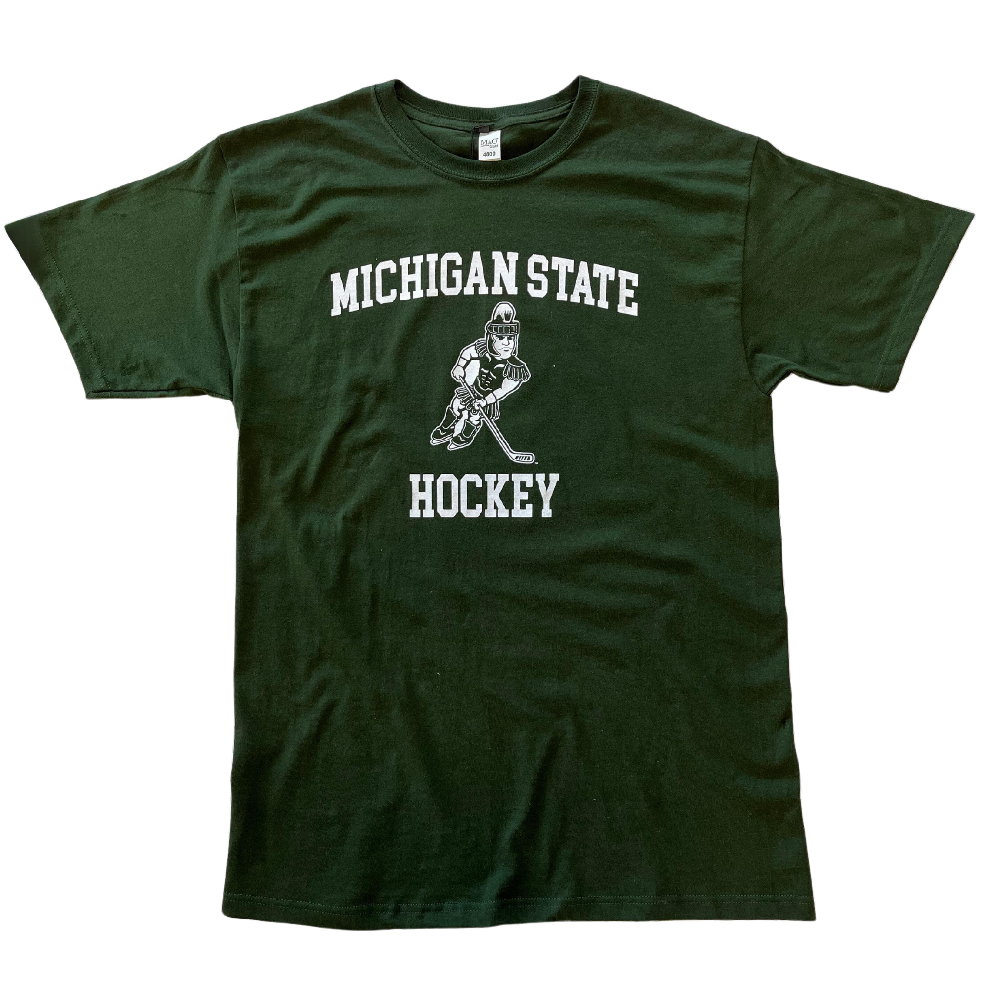 Forest green crewneck t-shirt with short sleeves. Centered on the chest, white block letters read “Michigan State” in a slight arch over an illustration of Sparty playing hockey. Below Sparty, additional white block letters read “Hockey.”