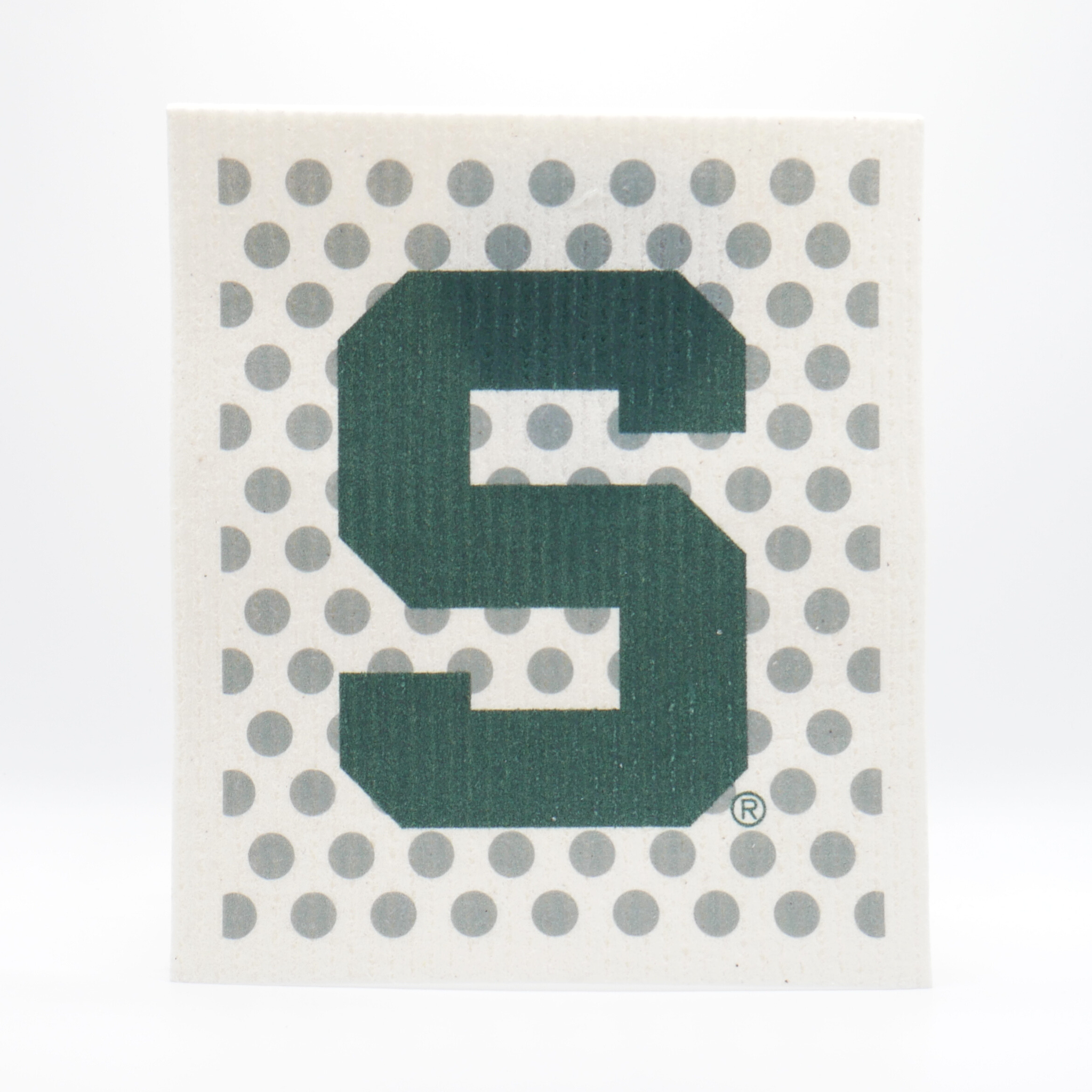 A cream re-usable absorbent square dish cloth with a gray polka-dot pattern. In front of the pattern in the center of the dish cloth is a dark green Michigan State block S logo.
