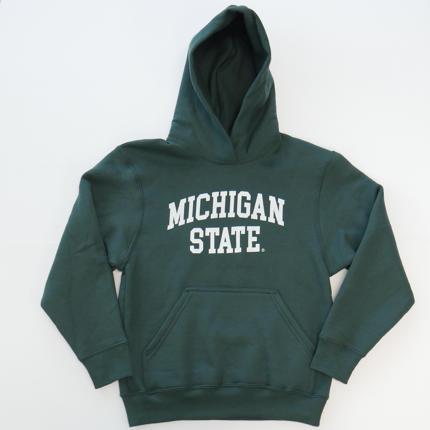 A dark green youth-sized hoodie with a curved white wordmark that reads "Michigan State" in the center of the hoodie.