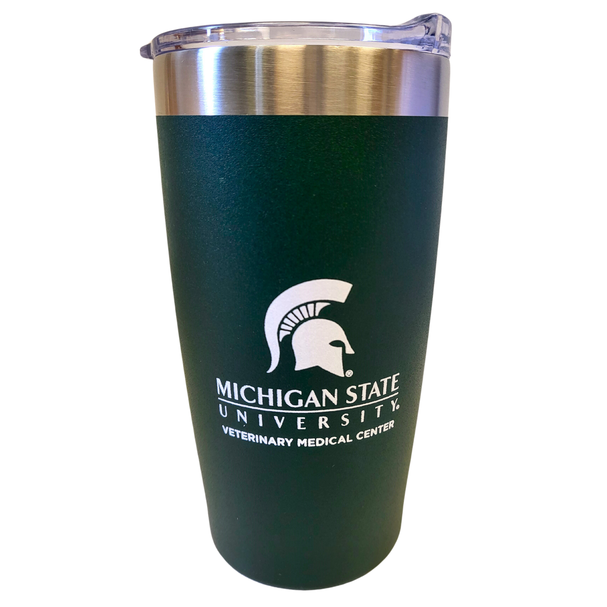 A curved stainless steel drink tumbler with a forest green powder coating on the bottom 90%. Printed in white on one side is a large Spartan helmet centered over the Michigan State University wordmark logo and bold block letters reading “Veterinary Medical Center.”