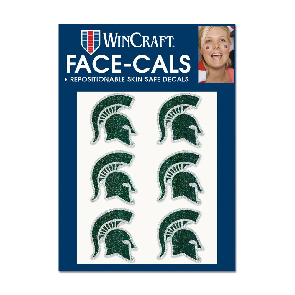 Michigan State Spartans glitter face decals package featuring six green Spartan Helmet decals with silver glitter borders on a blue backing card.