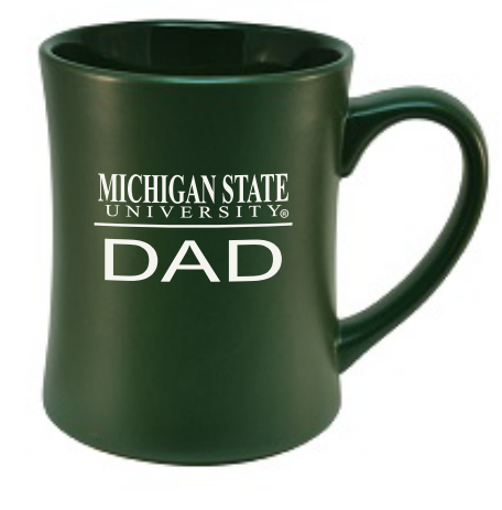 A green ceramic mug with 'Michigan State University Dad' text in white.