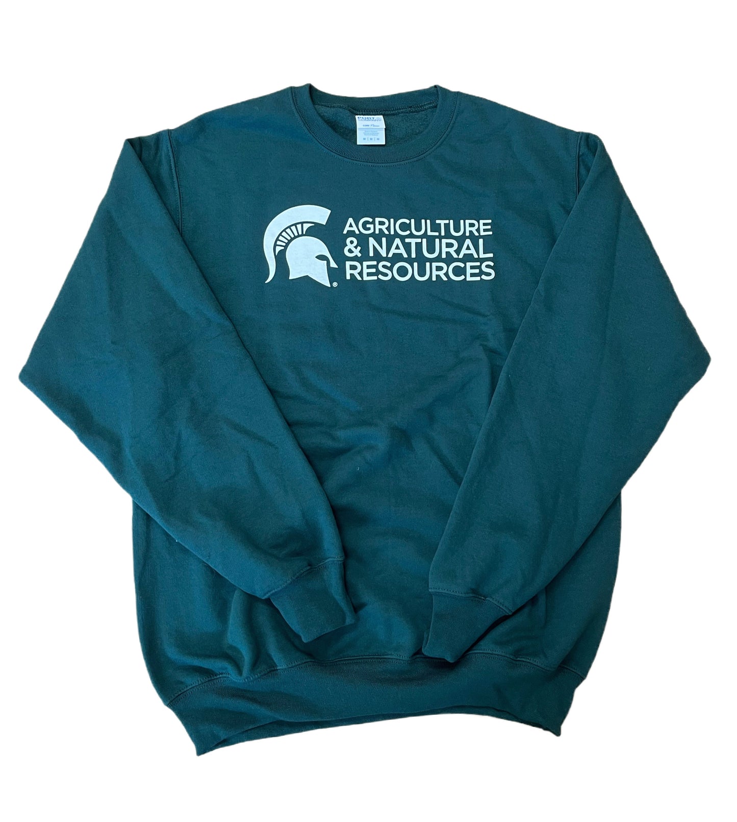 Forest green crewneck sweatshirt with long sleeves. Across the center chest is all-caps white text on three lines reading “Agriculture & Natural Resources.” To the left of the text is a white Spartan Helmet logo.