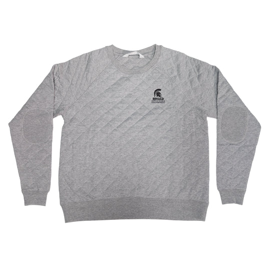 Light gray quilted pullover crewneck sweatshirt with a forest green embroidered Spartan Helmet over the Broad Supply Chain Management logo on left chest. Embroidered patches on elbows.