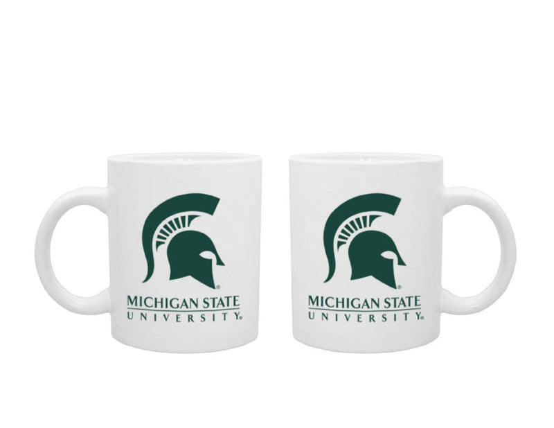 Two white with green mugs with the Michigan State University wordmark on the side.