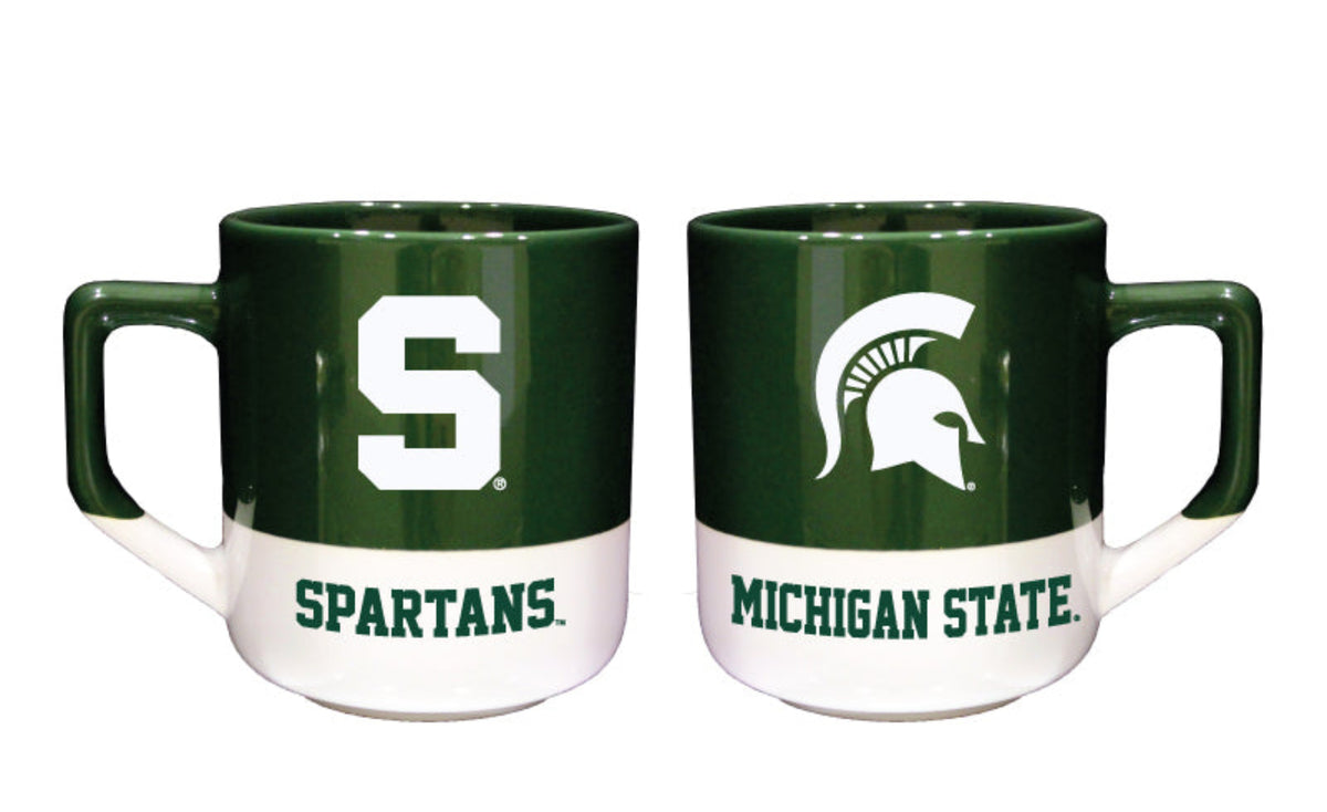 Two green and white mugs, showing both sides of the mug. The mug on the right side of the image has a green top section and white bottom section. The right mug has a block letter Spartan S logo in white and a green wordmark that reads "Spartans." The mug on the left side of the image has a green top section and white bottom section. The left mug has a white Spartan Helmet logo and a Michigan State wordmark. 