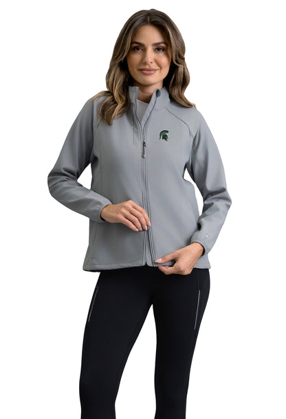 Woman wearing a gray full two-way zip jacket with a loose fit and dark green Spartan Helmet logo on the upper left chest.