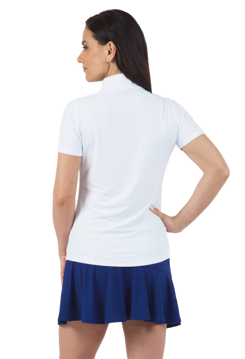 A woman showing the backside of a white mock neck quarter-zip short sleeve top.