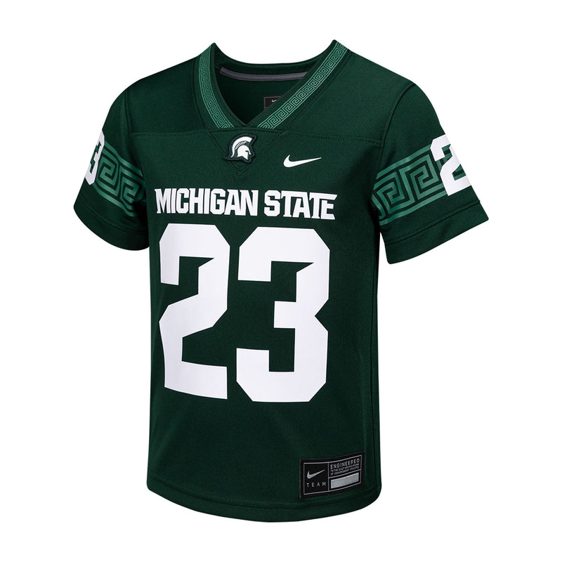 A youth football jersey in green with the number 23, featuring Michigan State branding and a Nike logo.