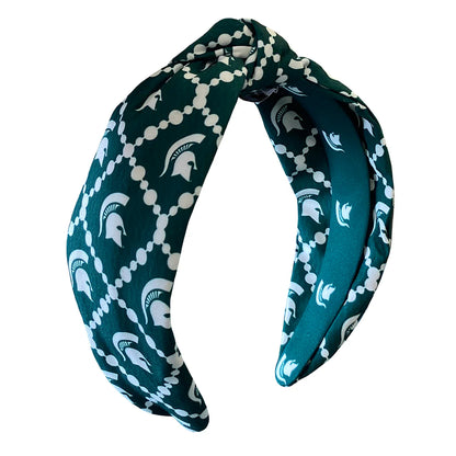 Forest green headband with white Spartan Helmet logos sublimated and  white dots linked in diamond shapes around the helmets. 