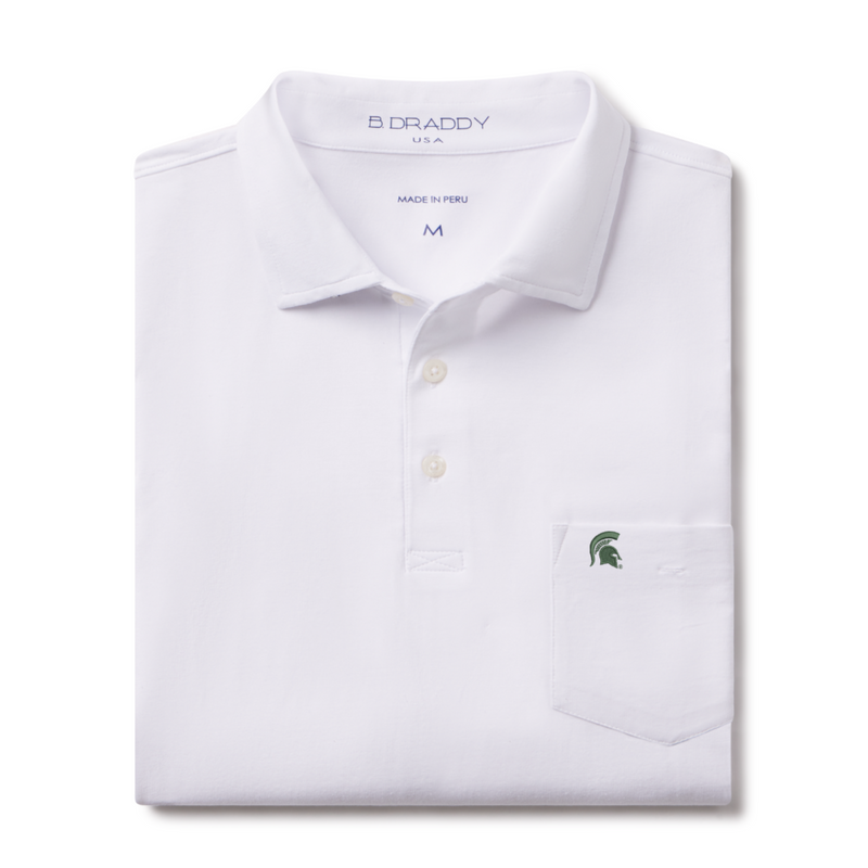 Folded white polo shirt with a collar and three-button placket, featuring a chest pocket with an embroidered green Spartan helmet logo and 'B DRADDY USA' branding inside the collar.