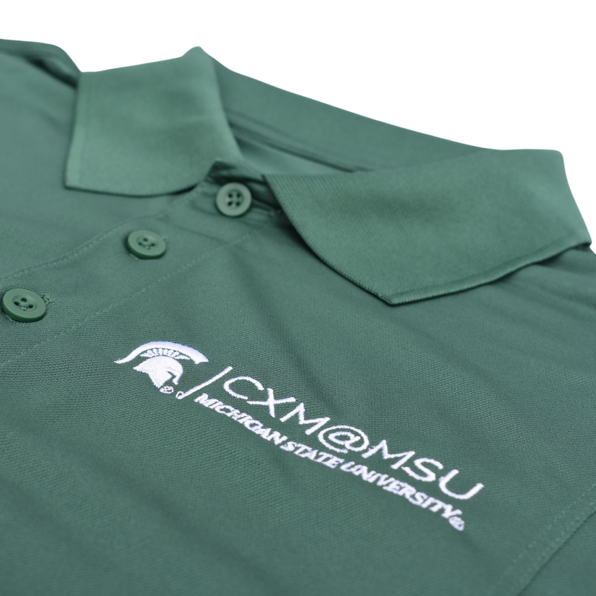 Close up of the embroidered CXM at MSU signature logo.