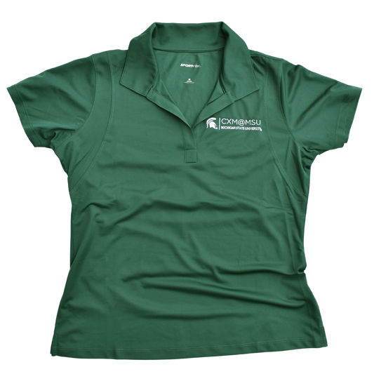 Green v-neck polo with the CXM at MSU signature logo embroidered in white on the left chest