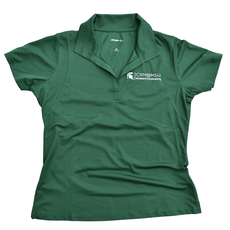 Green v-neck polo with the CXM at MSU signature logo embroidered in white on the left chest