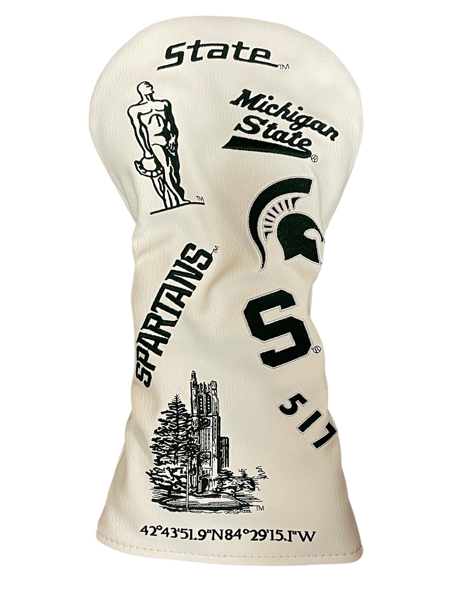 A white golf driver cover with various embroidered Michigan State logos. 