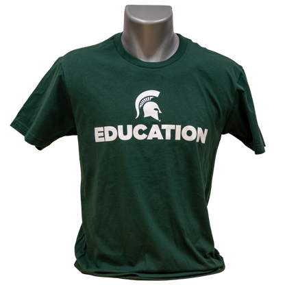 Forest green short-sleeve women's crewneck T-shirt with a white Spartan Helmet logo above text reading "Education" in all caps. Shown on a mannequin. 