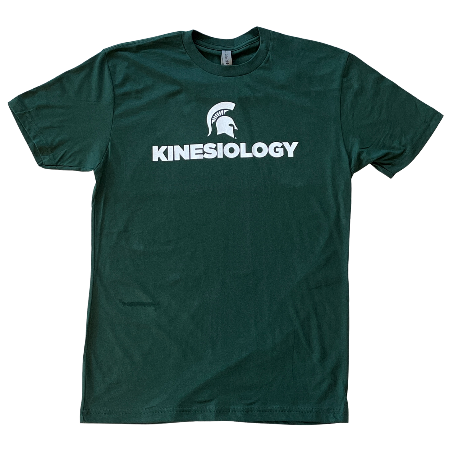 Forest green short-sleeve unisex crewneck T-shirt with a white Spartan Helmet logo above text reading "Kinesiology" in all caps.