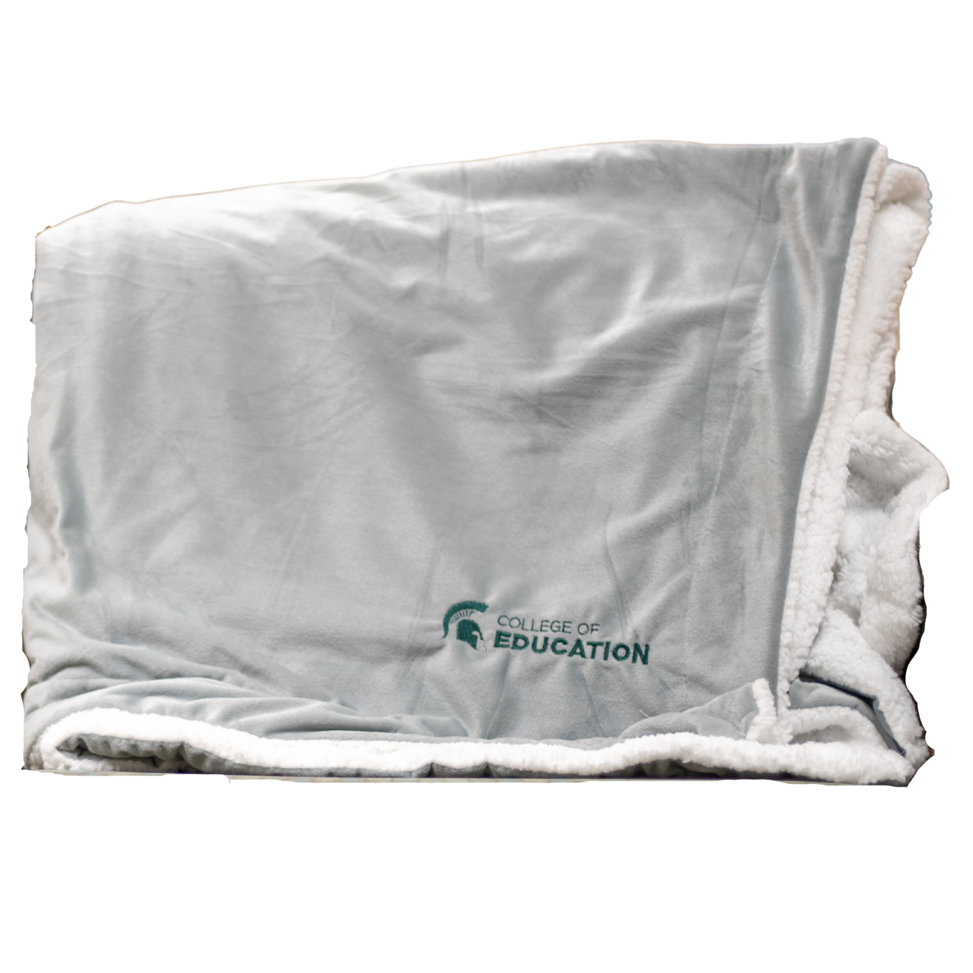 A gray plush blanket with a white, sherpa fleece lining. On the bottom right corner of the blanket, engraved in green, is an MSU Spartan Helmet logo with the words "College of Education."