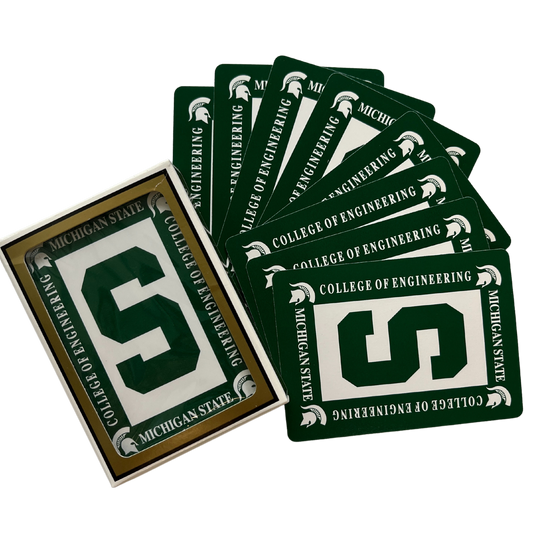 Green-backed playing cards that have a white rectangle in the center with a Spartan S. Around the rectangle are four Spartan Helmet logos and text reading "Michigan State College of Engineering."