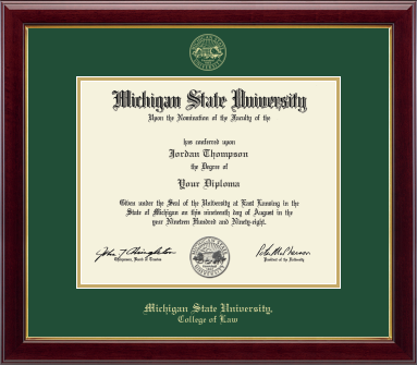 The diploma is set in a dark red wood frame with green matting, and includes the university seal and signatures. 'Michigan State University, College of Law' is printed at the bottom