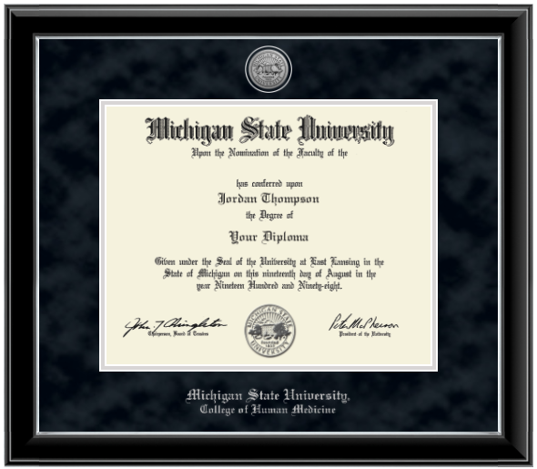 Black diploma frame with silver inner lining. Black suede matts with silver lining around opening for diploma. Silver engraved Michigan State University seal at top of matting. In silver letters "Michigan State University" at the bottom of matting. Below that in silver letters "College of Human Medicine."