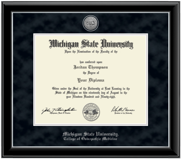 Black diploma frame with silver inner lining. Black suede matts with silver lining around opening for diploma. Silver engraved Michigan State University seal at top of matting. In silver letters "Michigan State University" at the bottom of matting. Below that in silver letters "College of Osteopathic Medicine."