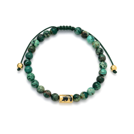 Green and black beaded bracelet with gold Spartan helmet charm.