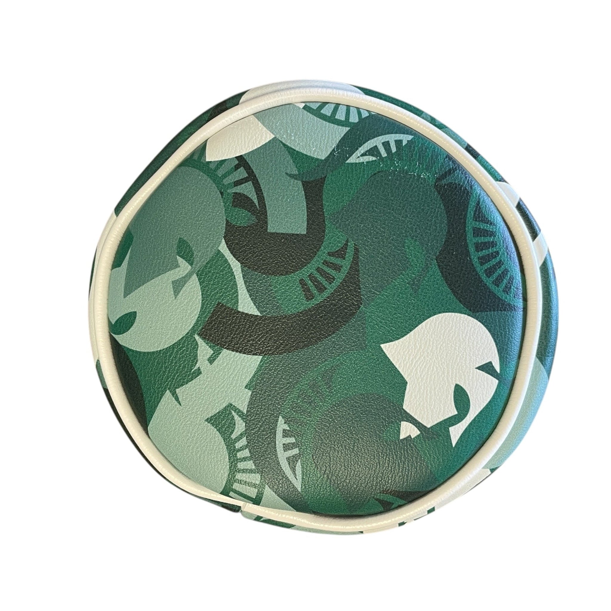 Top of green barrel cover with green, dark green, light green, and white Spartan helmets collaged together. Shown on a white background. 