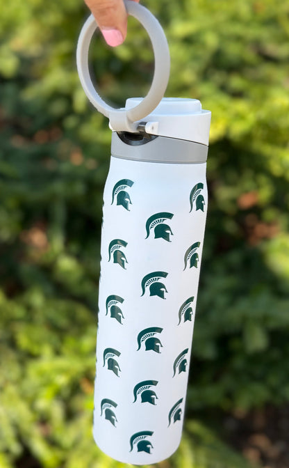 white water bottle with screen printed green Spartan helmets. Gray loop handle at the top of the water bottle. 